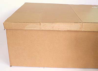 Photo of a cardboard box with a lid