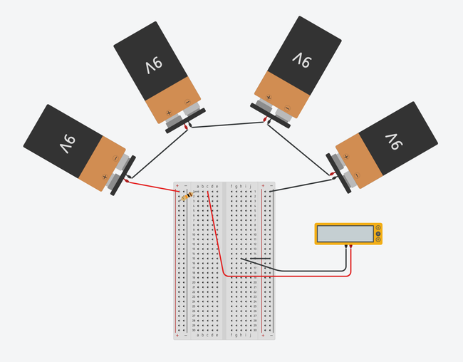 four 9V batteries connected in series using a half-size breadboard