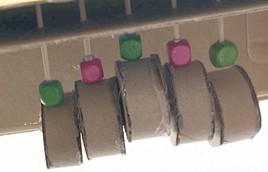  An illustration of the driving mechanism of the caterpillar automaton. The second picture is a snapshot taken half a turn later; so the driving cylinders form an upside down V shape. 