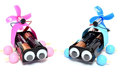 Two mini propeller cars.  