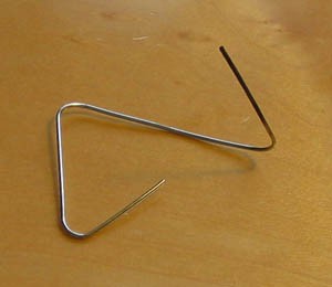 A paperclip into the shape of the letter Z
