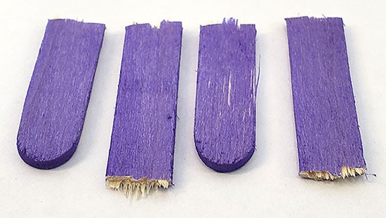  Four popsicle stick pieces 