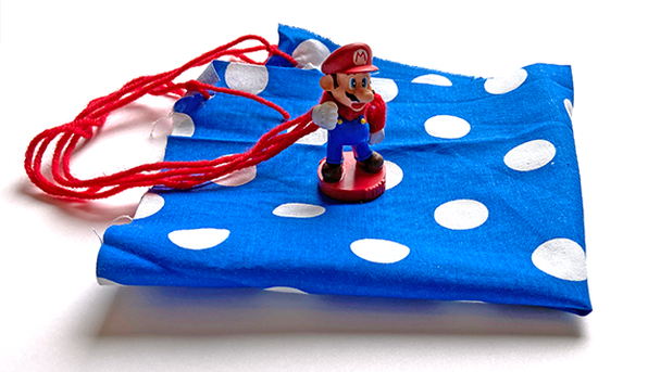 Parachute made from fabric and string with a Mario minifigure
