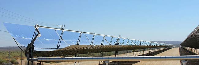 A row of parabolic solar reflectors
