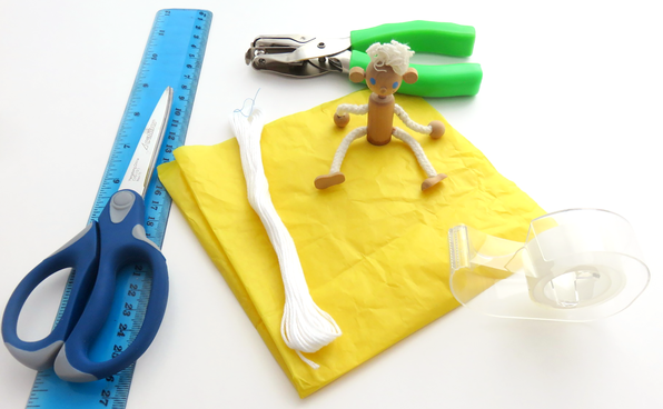 Toy figurine, craft supplies, and materials for parachute activity