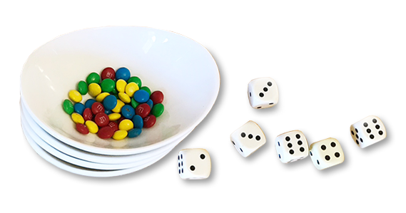 Bowl of candies and dice for a STEM activity to explore autoimmunity and probability