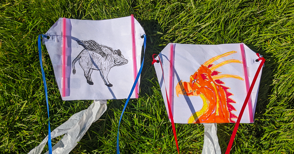 Two homemade sled kites that students have decorated
