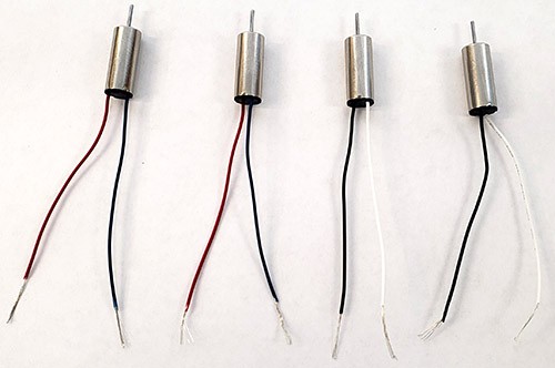 Four motors with insulation stripped off ends of wires