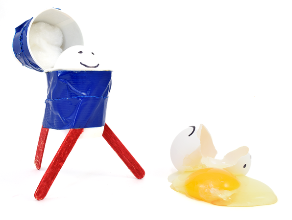 Sample egg drop device to help protect an egg next to a cracked egg