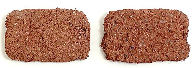  Two flat red-brown bricks, one set has a finer surface compared to the other set. 