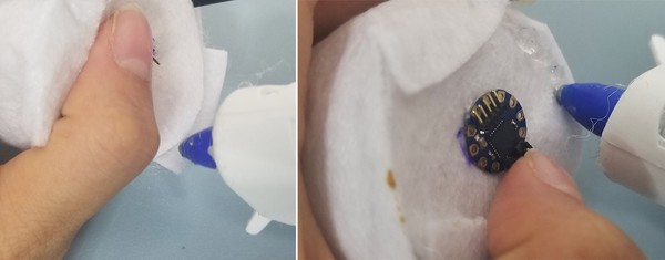 Hot gluing flaps on horn down to felt piece A. Hot gluing flaps on horn down to felt piece A