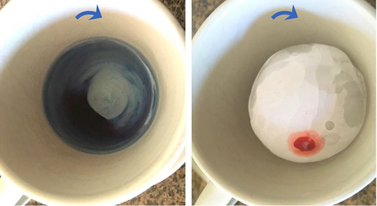 Two paper cups filled with water on the left and ice on the right spin clockwise after food coloring is added to each