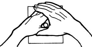 Two hands are held over each other leaving a small gap between both thumbs and first-knuckles to see through