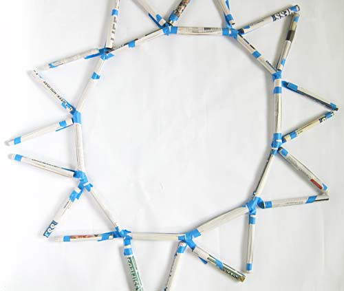 Long and short tubes combined to make triangles along a ring