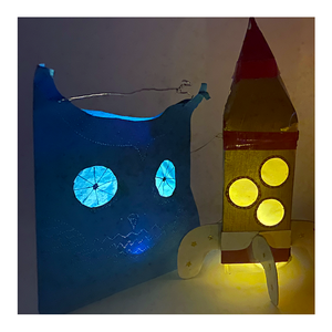 Two sample homemade lanterns using the night-light kit - Pirate-themed Make-Believe STEM Science Experiments
