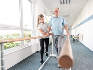 man learning to walk