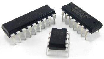 Three integrated circuits of different sizes side-by-side