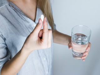Pill with water
