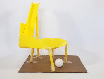A ball run with a large funnel built from paper and tape