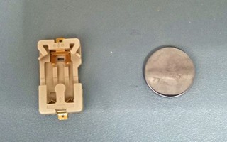 Coin cell battery holder and coin cell battery. 