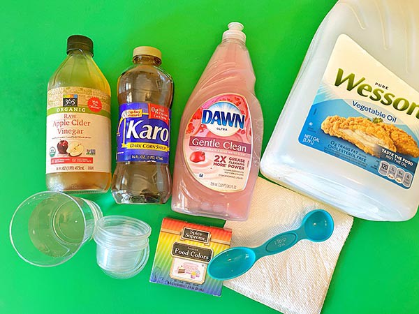 Materials needed for the 'Investigate the Properties of Liquids' lesson plan.