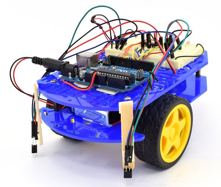  An Arduino robot with two downward-facing infrared sensors mounted on the front 