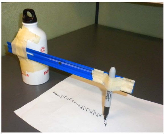 sharpie marker touching newspaper to record soup-can earthquake 