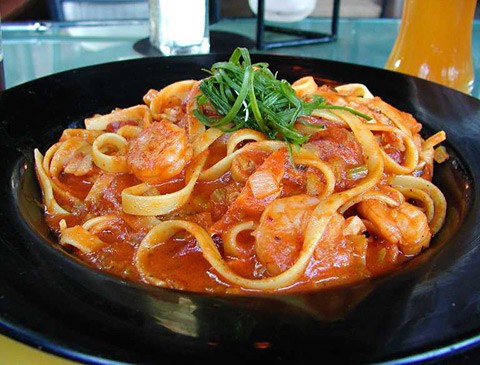 Photo of a plate of pasta with shrimp
