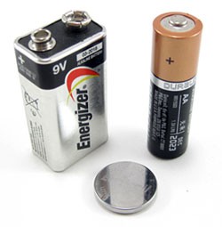 A 9 volt, double A and coin cell battery standing side-by-side