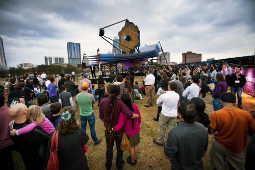 Crowd gathered around Northrop Grumman's model James Webb Space Telescope