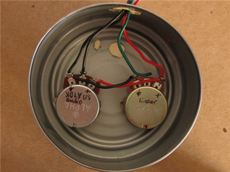 Two potentiometers inside of an aluminum can