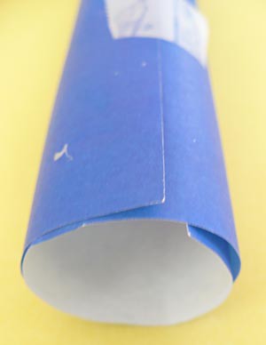 A roll of paper secured with tape