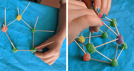 Students building geometric shapes with toothpicks and gumdrops