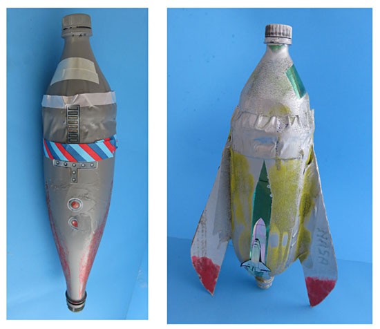 A plastic bottle is turned into a model rocket and is decorated