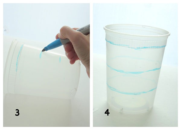 Blue lines are drawn in parallel around the sides of a plastic pot