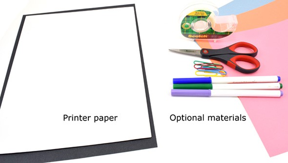 Printer paper, markers, scissors, tape, paperclips and colored construction paper