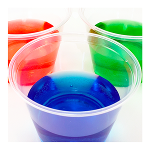 Three cups of differently colored liquids for a taste test - Willy Wonka-inspired Make-Believe STEM Science Experiments
