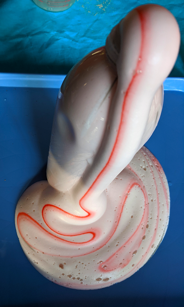 Red and white striped elephant toothpaste