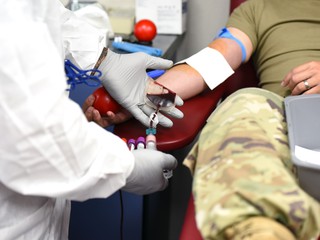 drawing blood from a patient 