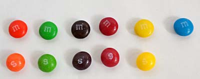 Side-by-side comparision of M&Ms and Skittles