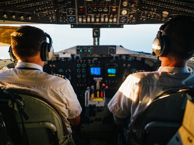 pilots in cockpit