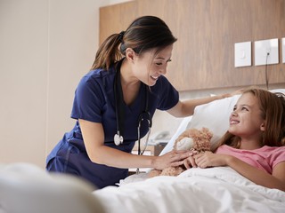 child in hospital bed