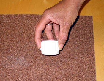 Plastic endcap rubbed against sandpaper
