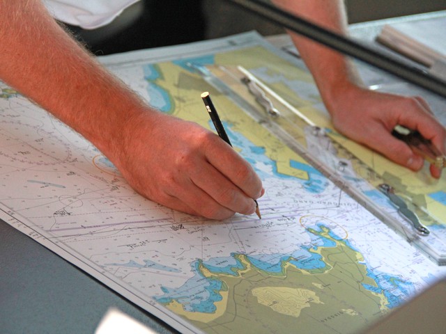 cartographer mapping out waters