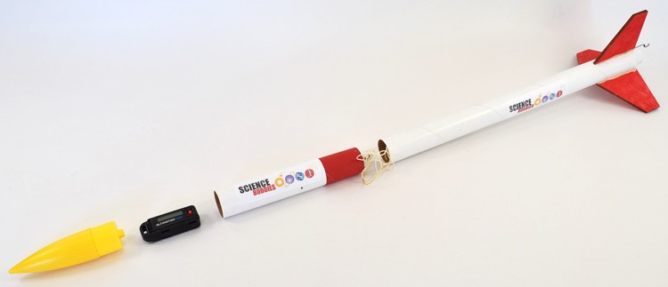 A disassembled rocket showing the payload bay