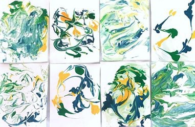samples of colorful paper marbling on cards 