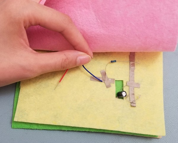 Red and blue wires connected for VCC patch. 
