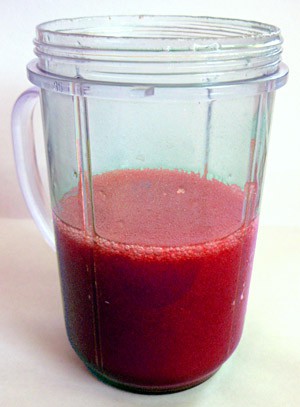 Blended mixture of water, sodium alginate and red food coloring