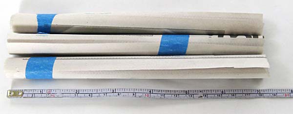 Newspaper tubes cut to eighteen centimeters in length
