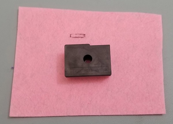 Dust sensor patch with drawn out rectangle to cut for wire. 